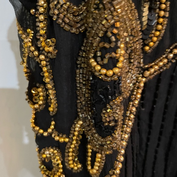 All silk hand beaded black dress with gold beading . Fits as women’s small . - Picture 4 of 6